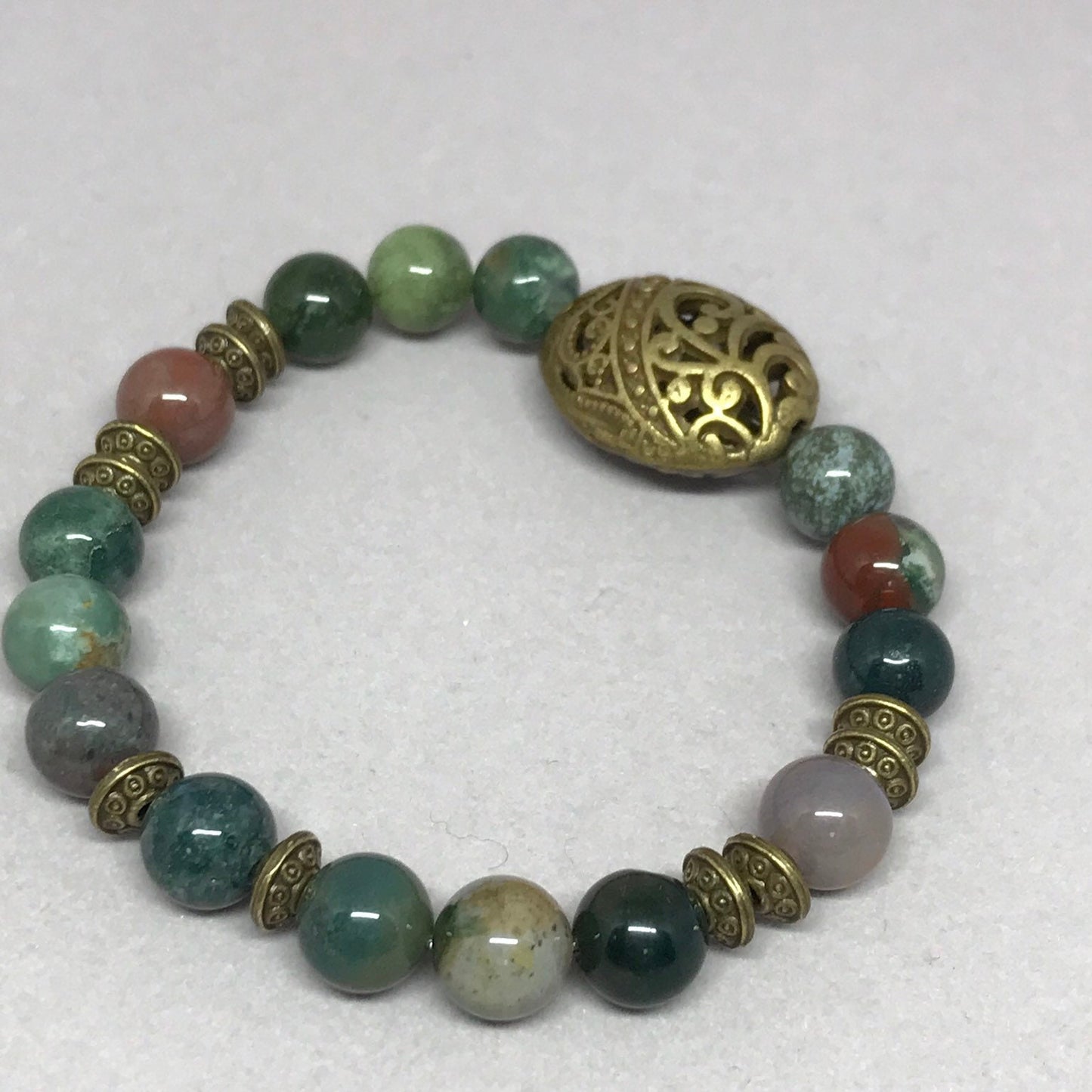 Bloodstone mala bracelet with antique bronze beads