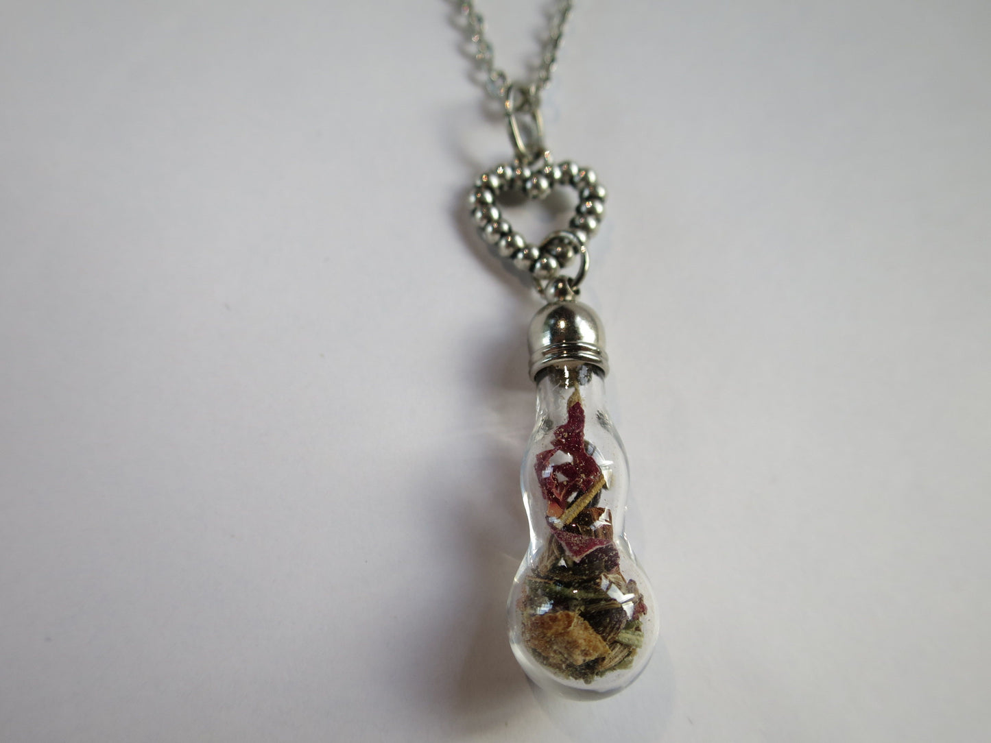 Love Talisman necklace, floral spell bottle.