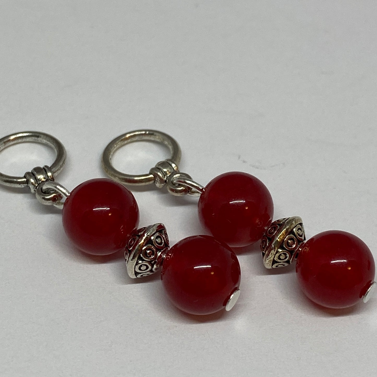 Red agates and silver knitting markers