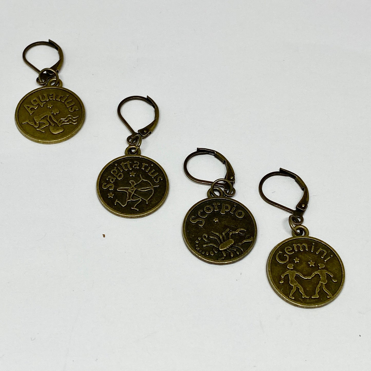 Zodiac sign stitch markers ,set of four