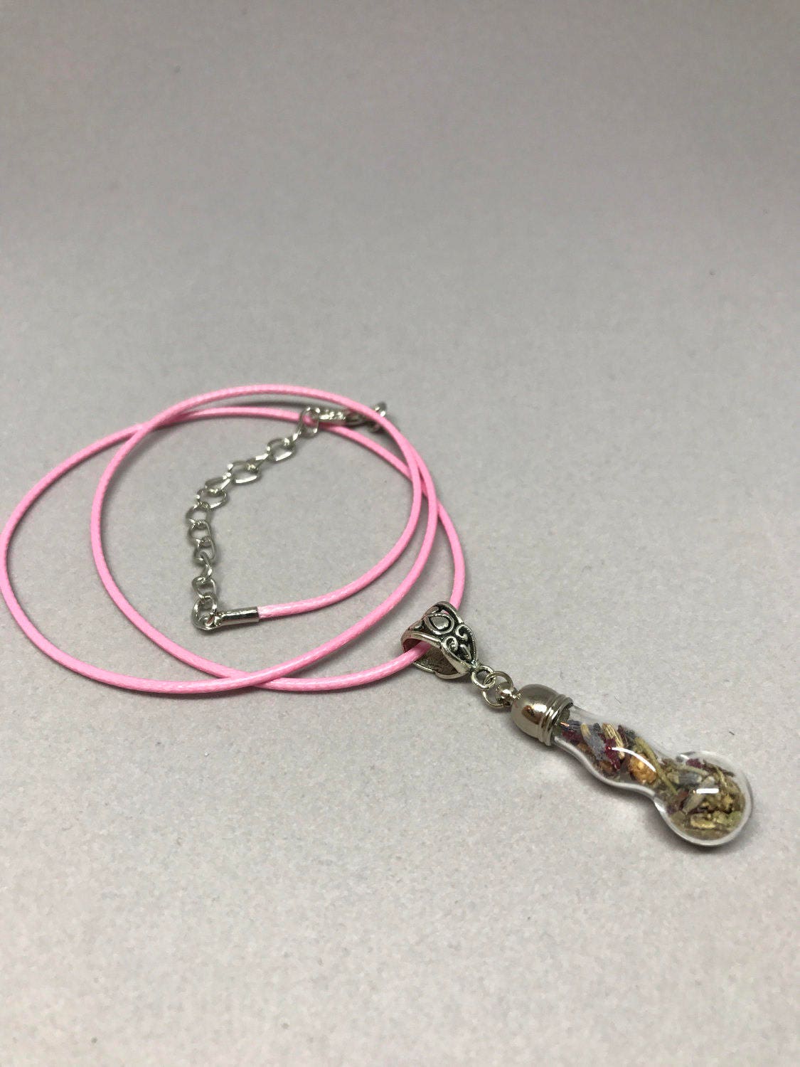 Love Talisman necklace, charm bottle to attract loving intentions.