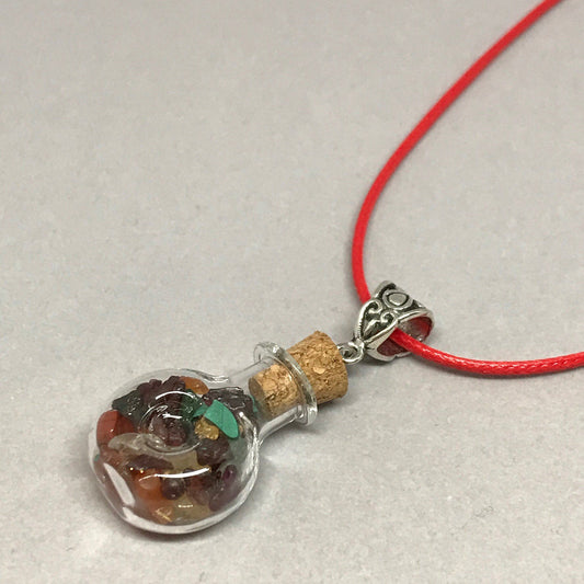 Good fortune charm bottle necklace.