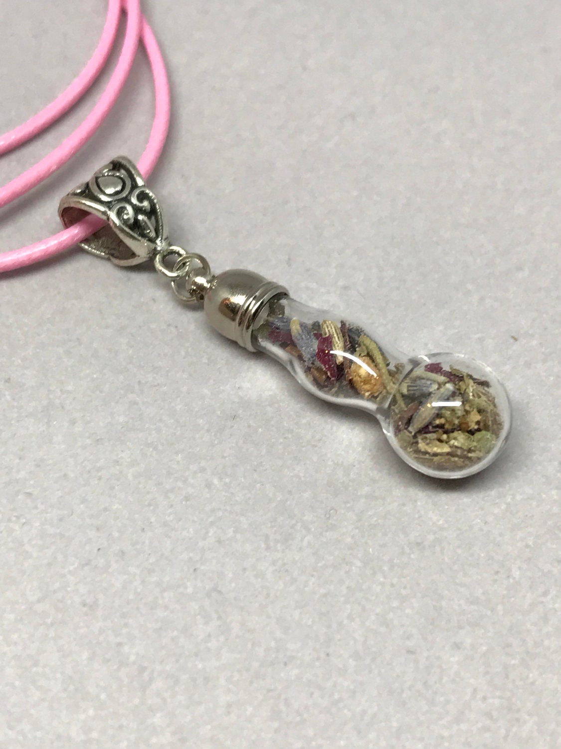 Love Talisman necklace, charm bottle to attract loving intentions.