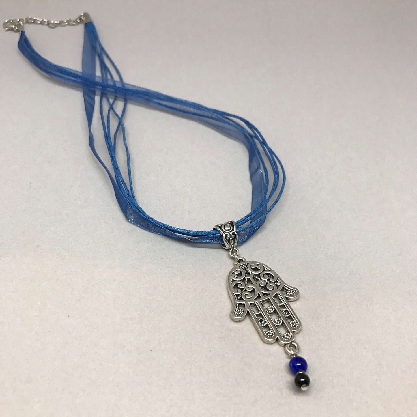 Lapis lazuli Fatima hand necklace