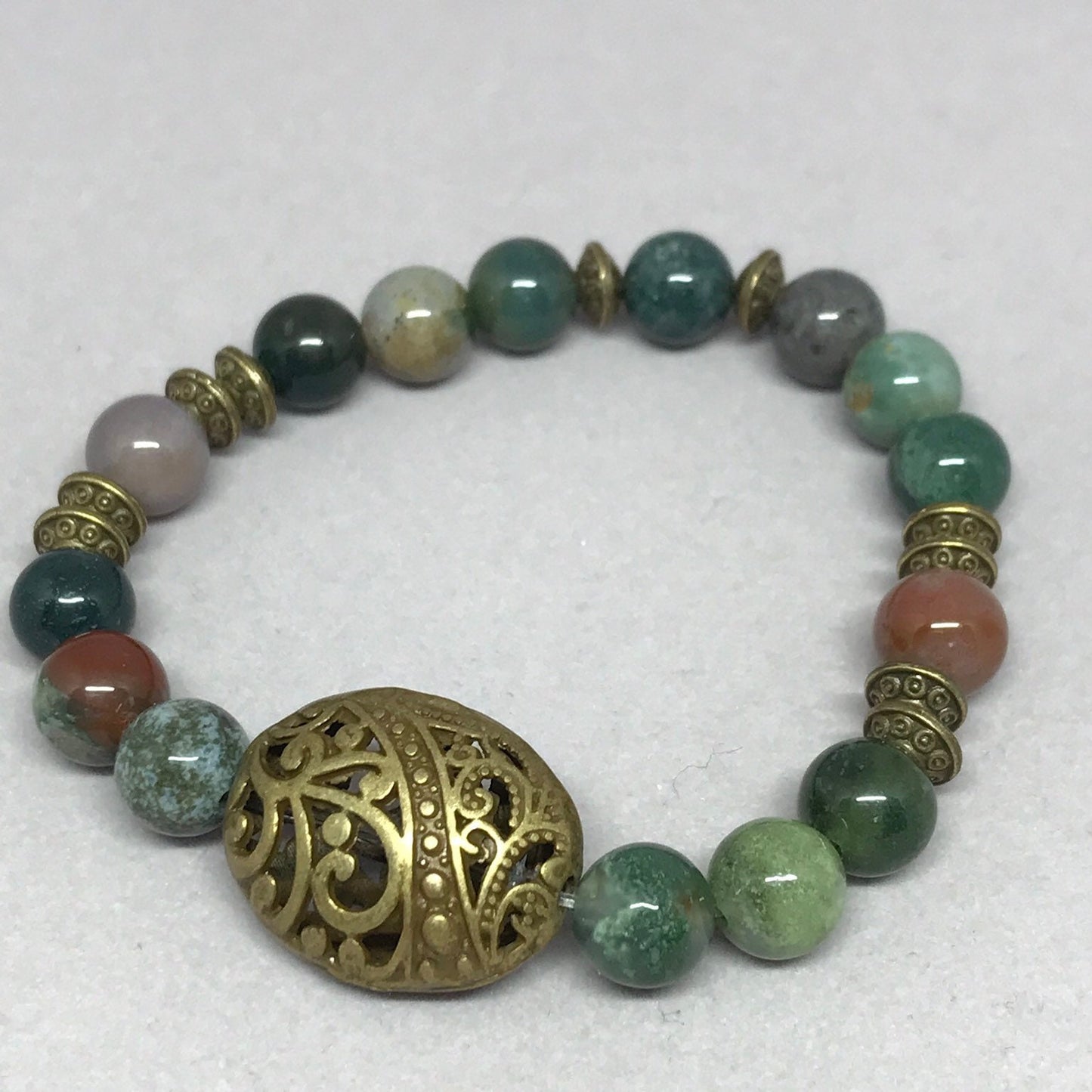 Bloodstone mala bracelet with antique bronze beads