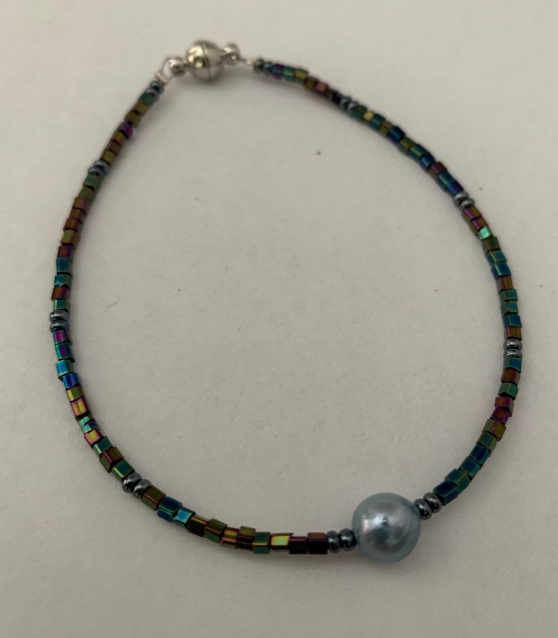 Iridescent seed bead and pearl bracelet