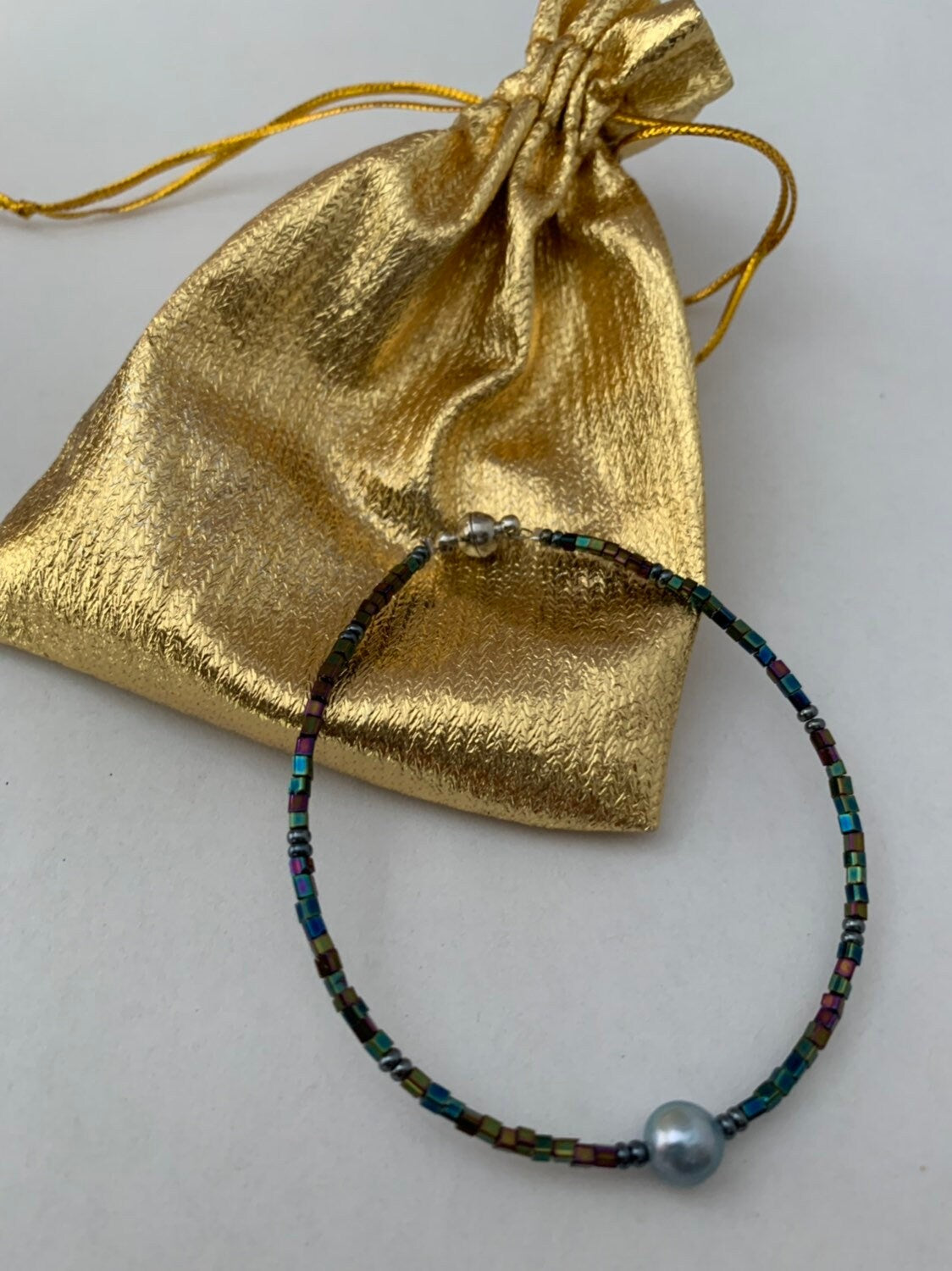 Iridescent seed bead and pearl bracelet