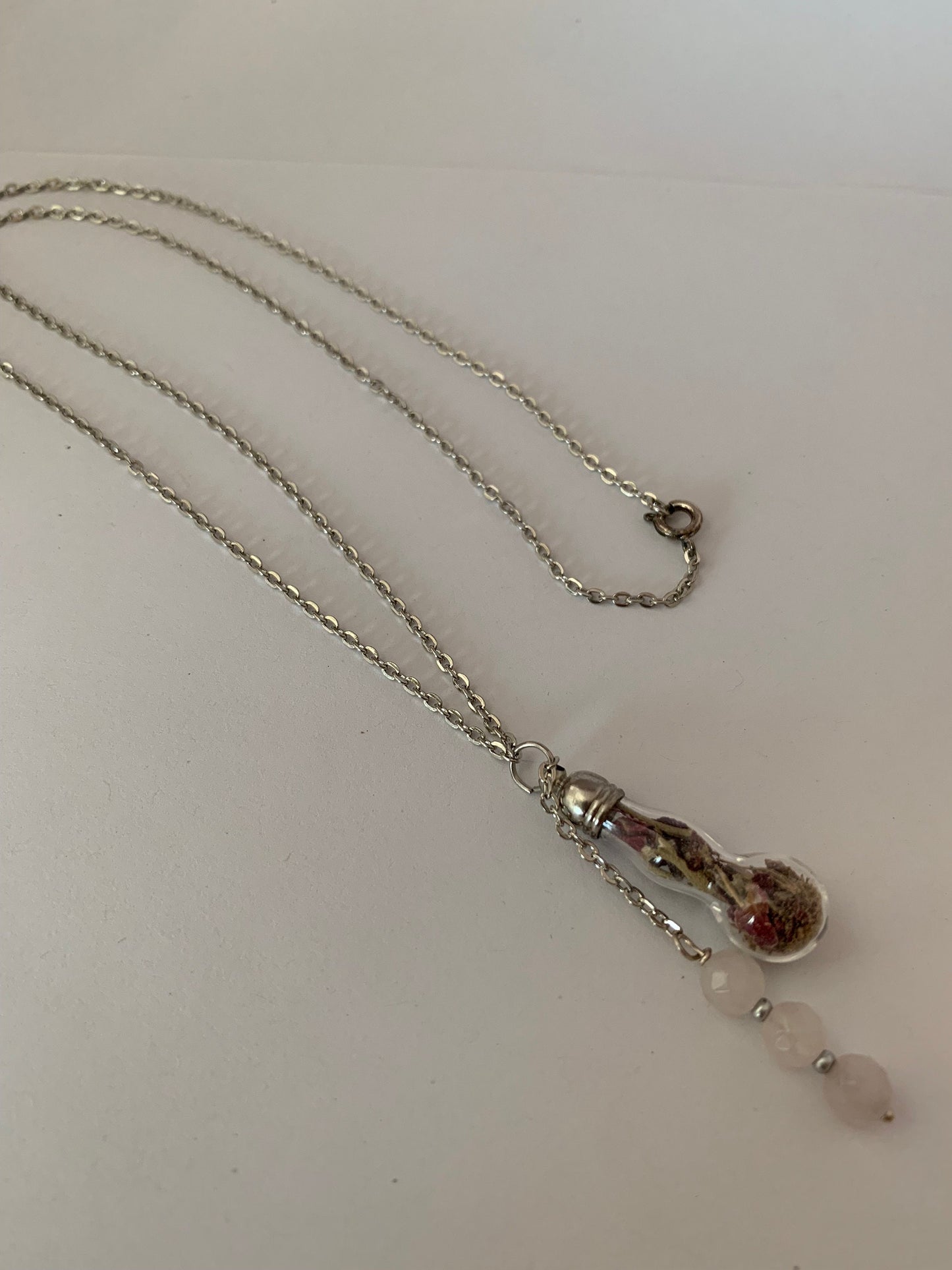 Talisman necklace, love charm bottle.