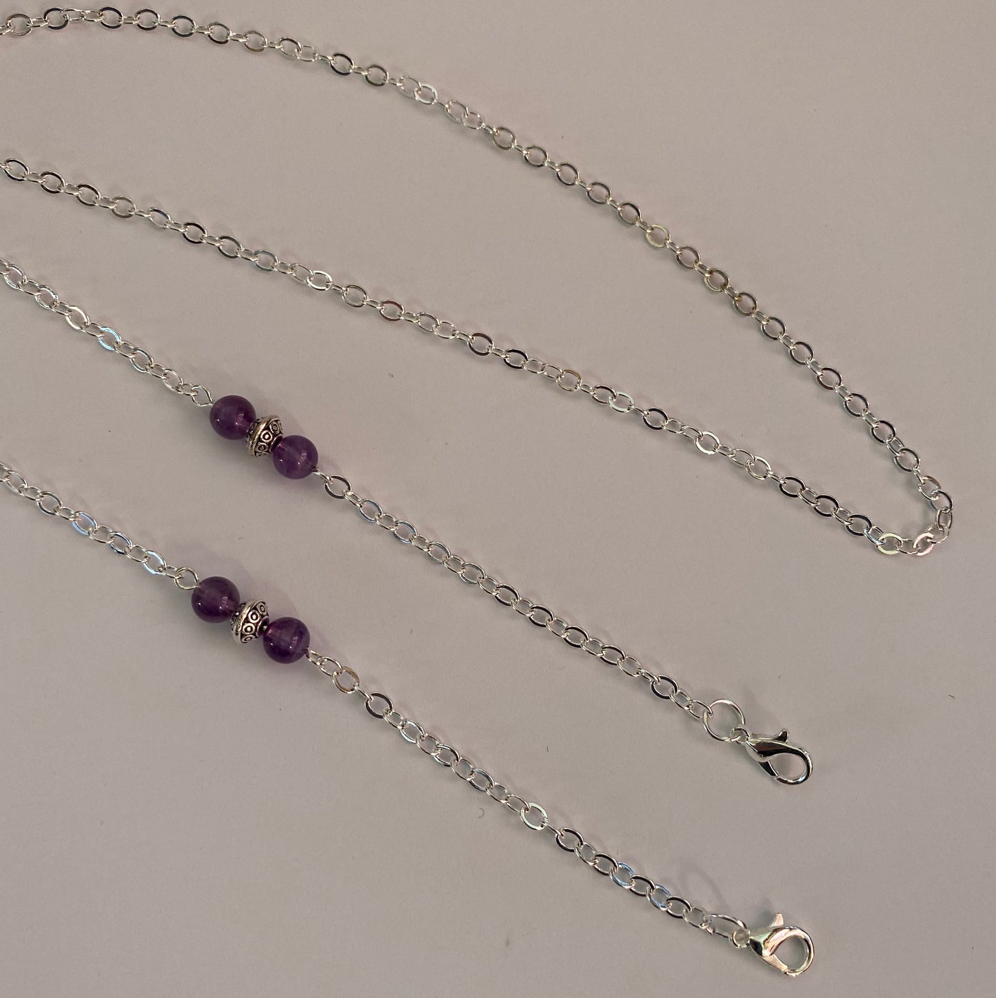 Silver eyeglass chain with amethysts