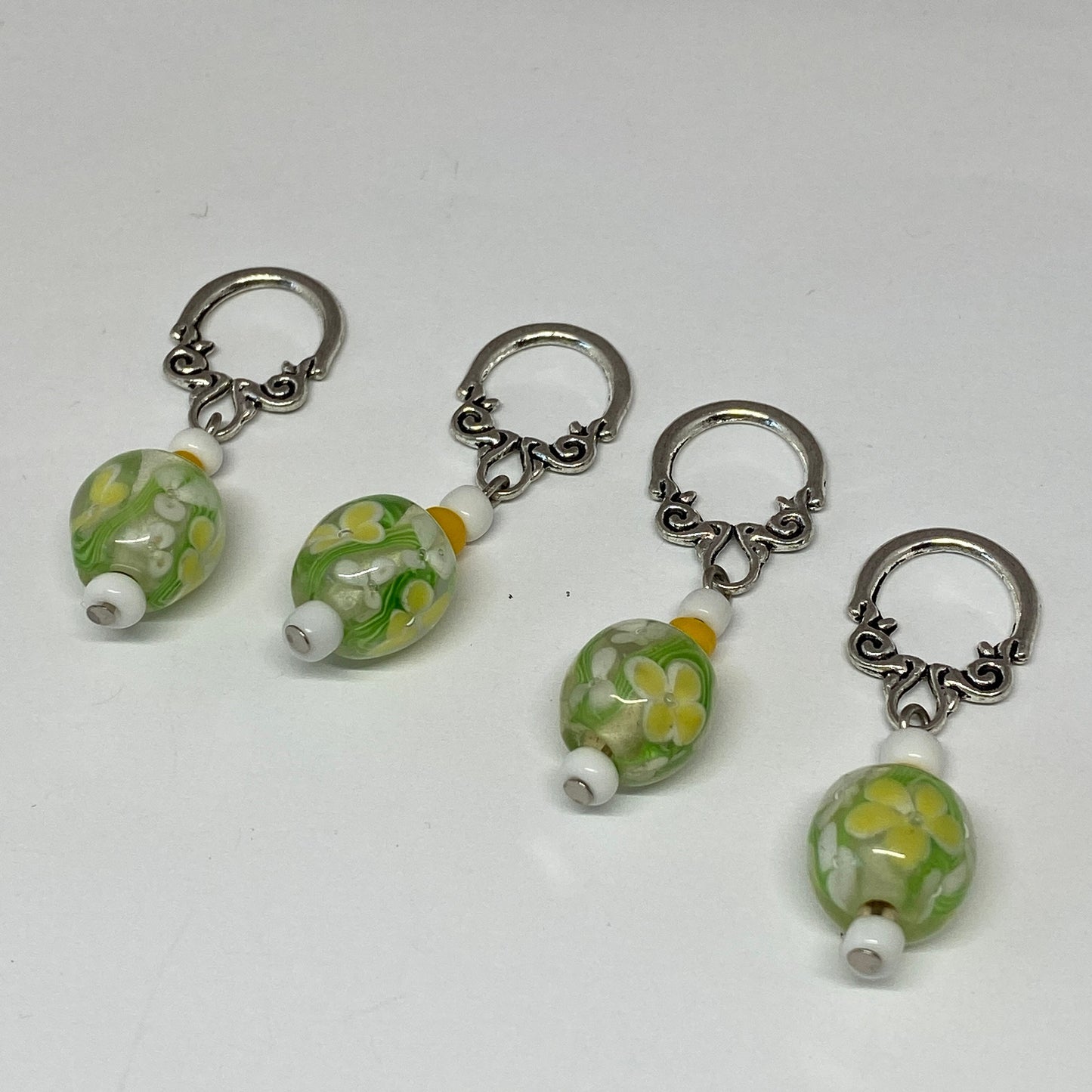 Green floral stitch markers