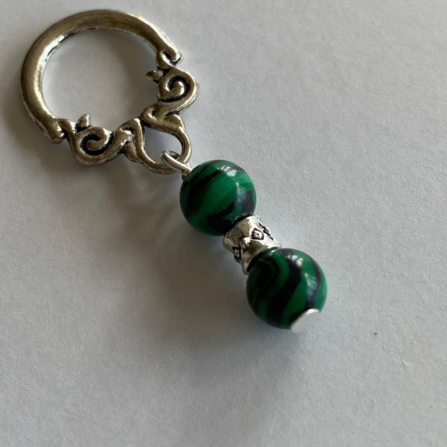 Malachite gemstone stitch markers with scroll loops