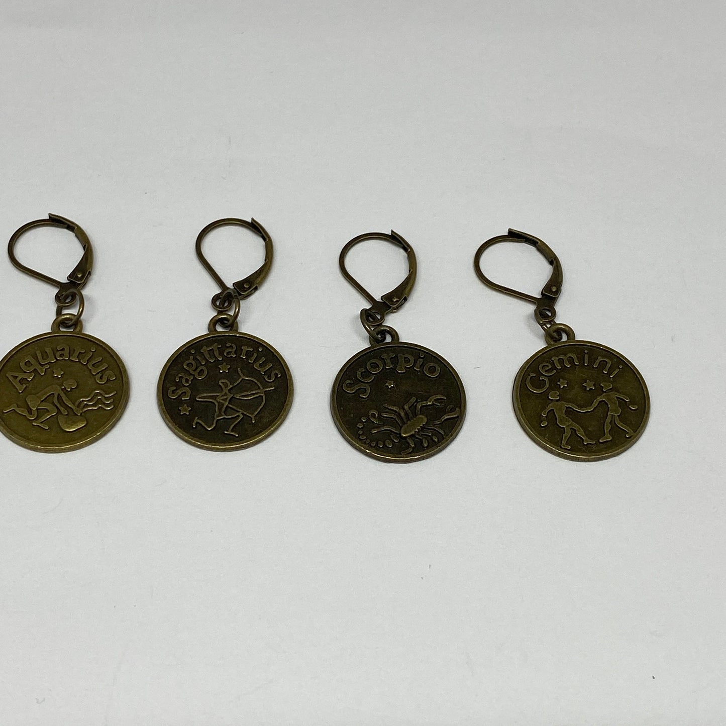 Zodiac sign stitch markers ,set of four