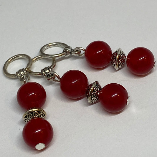 Red agates and silver knitting markers