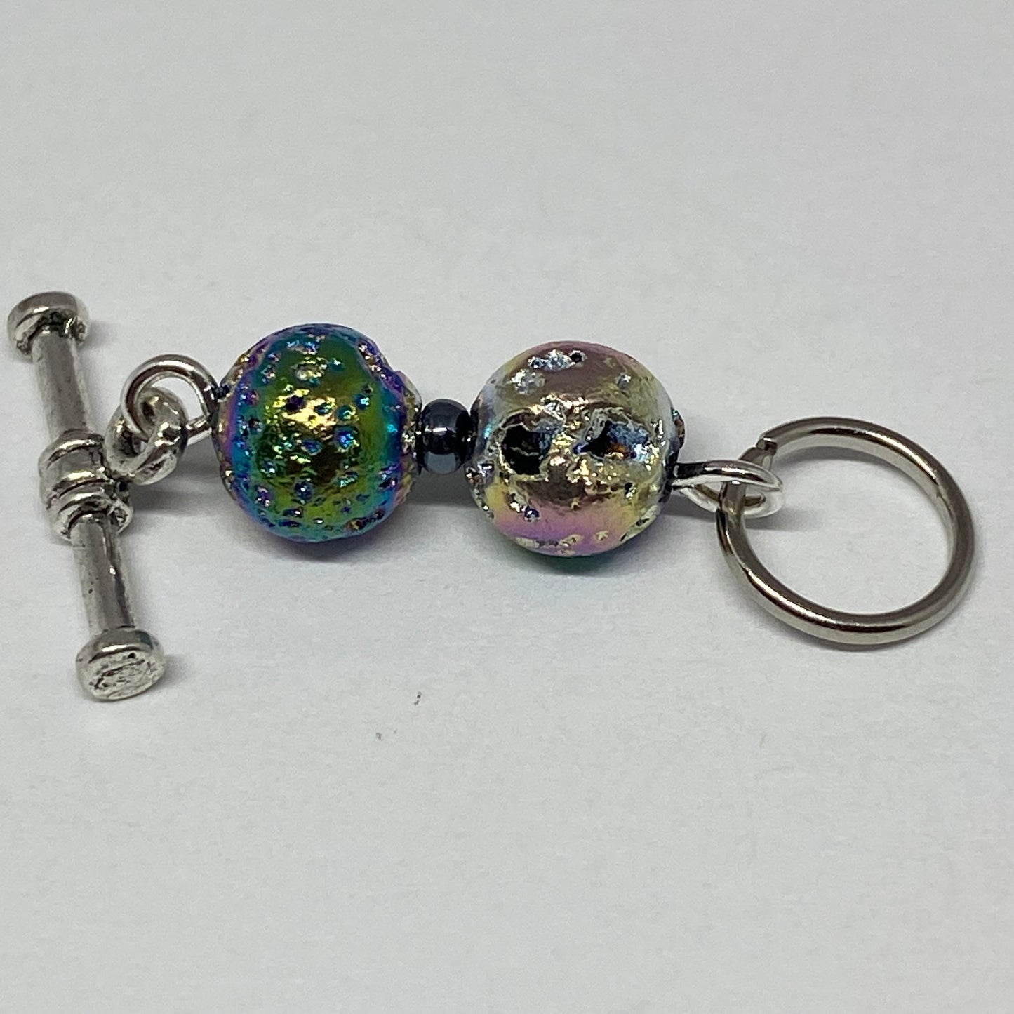 Iridescent blue stitch markers