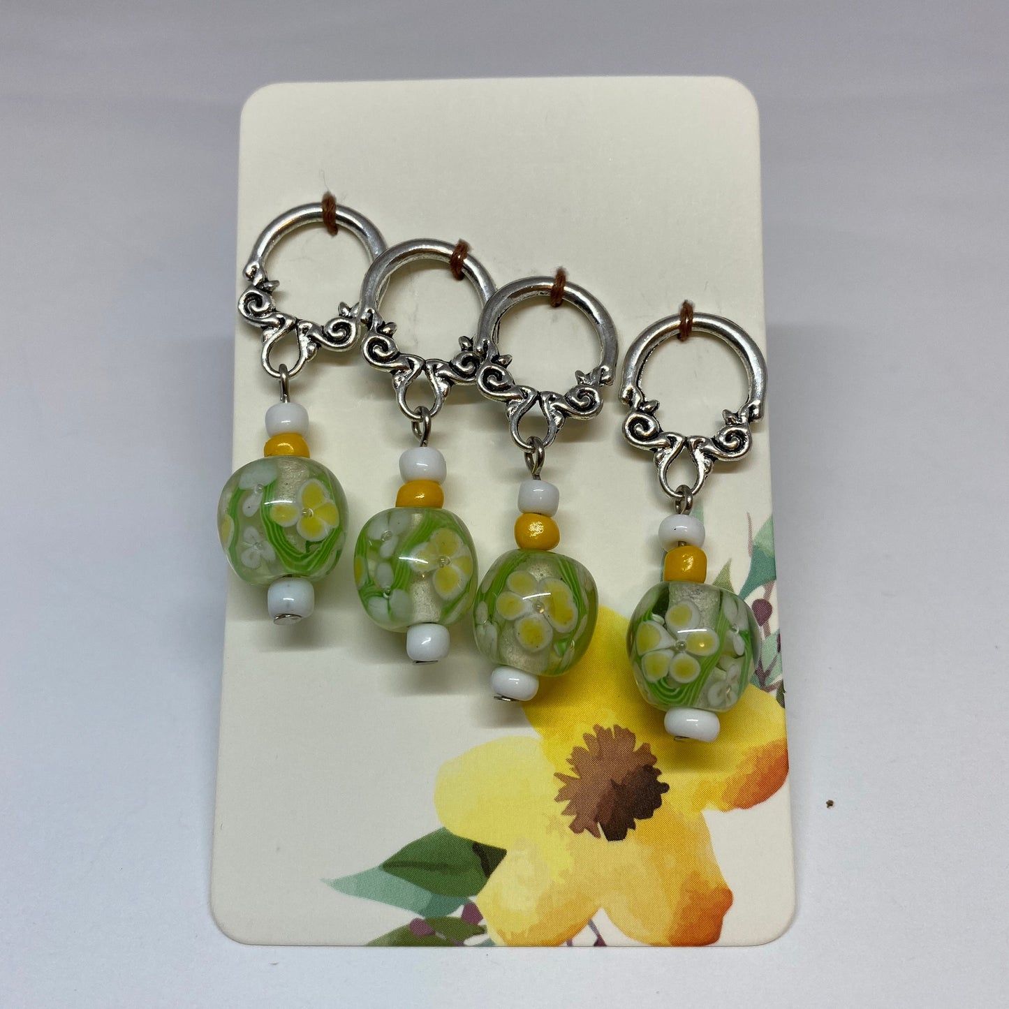 Green floral stitch markers