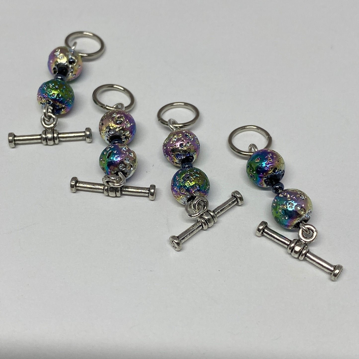 Iridescent blue stitch markers